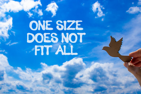 One size does not fit all symbol. Concept words One size does not fit all on beautiful sky....