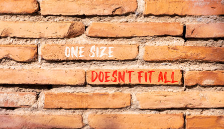 One size does not fit all symbol. Concept words One size does not fit all on beautiful brick wall....
