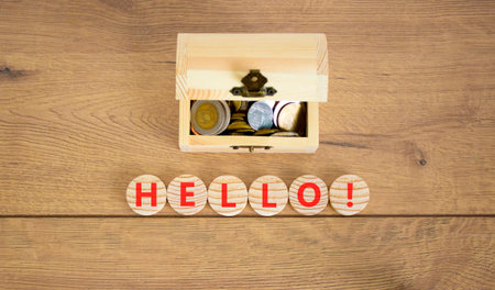 Hello welcome support and help symbol. Concept word Hello on beautiful wooden circles. Beautiful wooden background. Business psychological hello support and help concept. Copy space.の写真素材