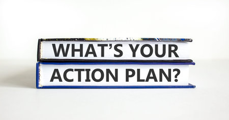 What is your action plan symbol. Concept words What is your action plan on beautiful books. Beautiful white paper background. Business what is your action plan concept. Copy space.の写真素材