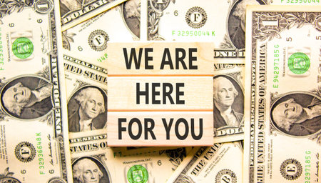 Support, help and we are here for you symbol. Concept words We are here for you on beautiful wooden...