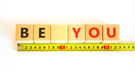 Be you support and help symbol. Concept word Be you on beautiful wooden blocks. Beautiful white...