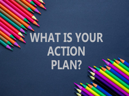 What is your action plan symbol. Concept words What is your action plan on beautiful gray paper. Beautiful gray background. Colored pencils. Business what is your action plan concept. Copy space.の写真素材