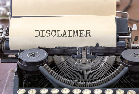 Disclaimer symbol. Concept word Disclaimer typed on beautiful old retro typewriter. Beautiful white paper background. Business disclaimer concept. Copy space.の写真素材