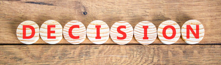 Decision word symbol. Concept word Decision on beautiful wooden circles. Beautiful wooden...