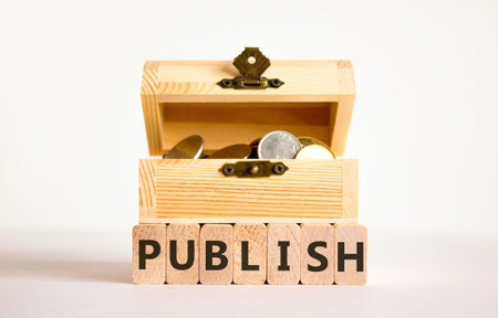 Publish word symbol. Concept word Publish on beautiful wooden blocks. Beautiful white background....
