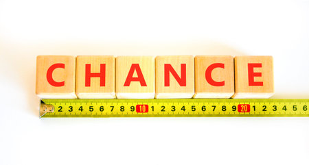 Chance symbol. Concept word Chance on beautiful wooden blocks. Beautiful white background. Beautiful...
