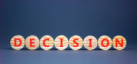 Decision word symbol. Concept word Decision on beautiful wooden circles. Beautiful gray background....