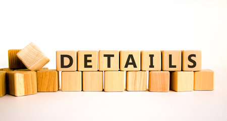 Details detail symbol. Concept word Details on beautiful wooden blocks. Beautiful white background....
