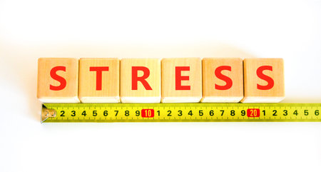 Stress word symbol. Concept word Stress on beautiful wooden blocks. Beautiful white background....