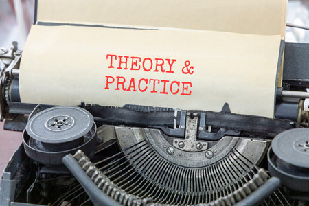 Theory and practice symbol. Concept words Theory and practice typed on beautiful old retro typewriter. Beautiful white paper background. Business theory and practice concept. Copy space.の写真素材