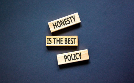 Honesty is the best policy symbol. Concept words Honesty is the best policy on beautiful wooden blocks. Beautiful black background. Business honesty is the best policy concept. Copy space.の写真素材
