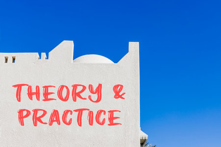 Theory and practice symbol. Concept words Theory and practice on beautiful white wall. Beautiful white wall and blue sky background. Business theory and practice concept. Copy space.の写真素材