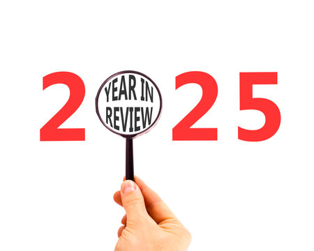 2025 year in review symbol. Concept words 2025 year in review in beautiful magnifying glass....
