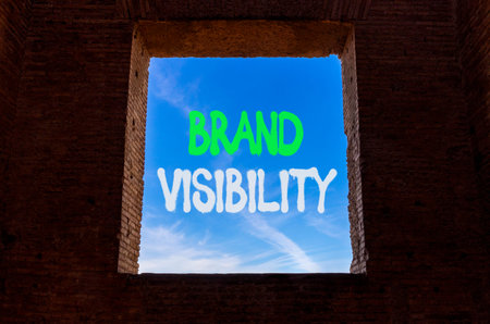 Brand visibility symbol. Concept words Brand visibility on beautiful blue sky in window in ancient...