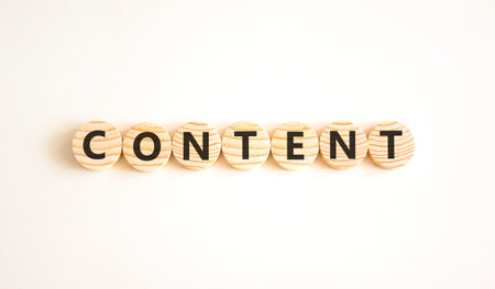 Content symbol. Concept word Content on beautiful wooden circles. Beautiful white background....