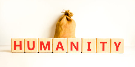 Humanity word symbol. Concept word Humanity on beautiful wooden blocks. Beautiful white background....