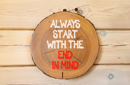 Start with the end in mind symbol. Concept words Always start with the end in mind on beautiful wooden circle. Beautiful wooden background. Business start with the end in mind concept. Copy space.の写真素材