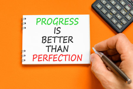 Progress or perfection words symbol. Concept words Progress is better than perfection on beautiful...