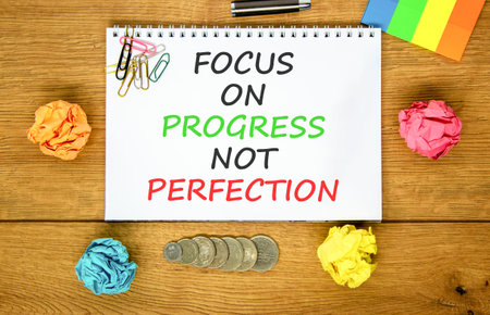 Progress or perfection words symbol. Concept words Focus on progress not perfection on beautiful...