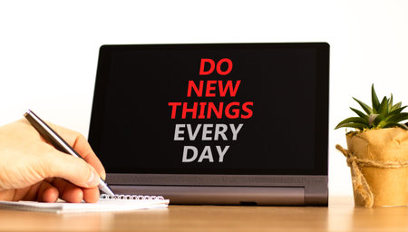 Do new things every day words symbol. Concept words Do new things every day on beautiful black...