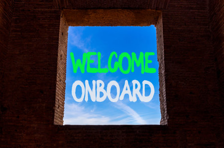Welcome onboard symbol. Concept words Welcome onboard on beautiful blue sky in window in ancient...