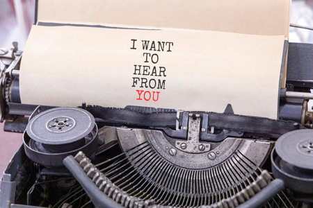 I want to hear from you symbol. Concept words I want to hear from you typed on old retro typewriter....