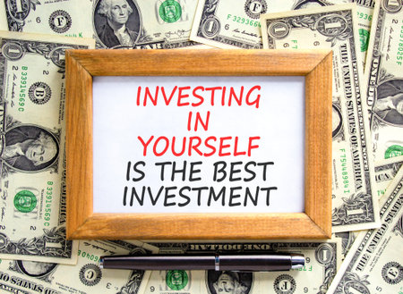 Investing in yourself symbol. Concept words Investing in yourself is the best investment on...
