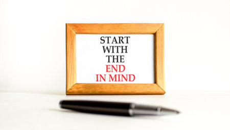 Start with the end in mind symbol. Concept words Start with the end in mind on beautiful wooden...