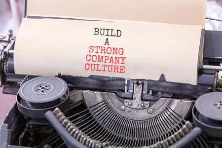 Strong company culture symbol. Concept words Build a strong company culture typed on old retro...
