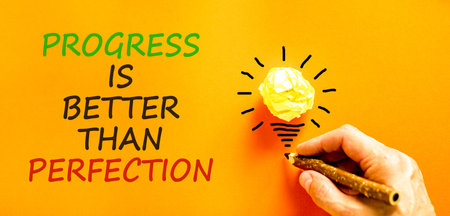 Progress or perfection words symbol. Concept words Progress is better than perfection on beautiful...