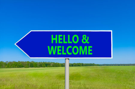 Hello and welcome symbol. Concept words Hello and welcome on beautiful blue road sign. Beautiful...