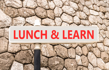 Lunch and learn symbol. Concept words Lunch and learn on beautiful big white road sign. Beautiful...