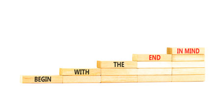 Begin with the end in mind symbol. Concept words Begin with the end in mind on beautiful wooden...