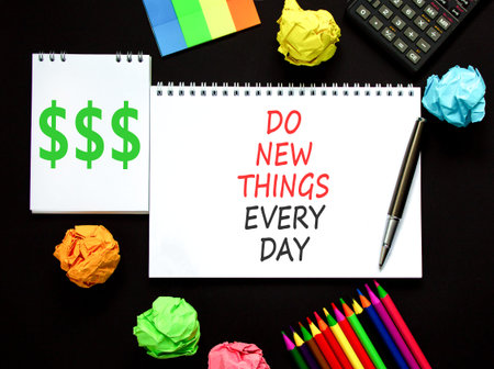 Do new things every day words symbol. Concept words Do new things every day on beautiful white note....
