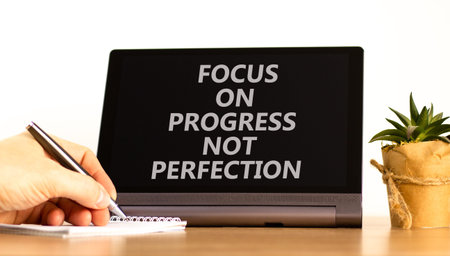 Progress or perfection words symbol. Concept words Focus on progress not perfection on beautiful...