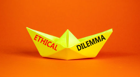 Ethical dilemma words symbol. Concept words Ethical dilemma on beautiful yellow paper boat....
