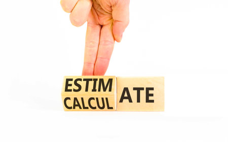 Estimate or calculate symbol. Concept words Calculate to Estimate on beautiful wooden cubes....