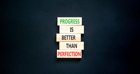 Progress or perfection words symbol. Concept words Progress is better than perfection on beautiful...
