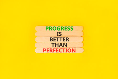 Progress or perfection words symbol. Concept words Progress is better than perfection on beautiful...