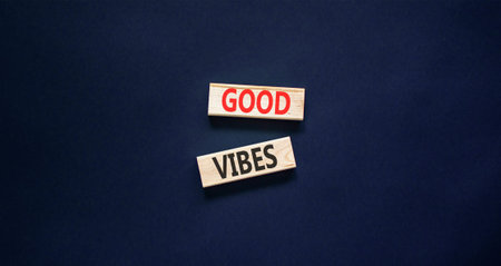 Good vibes words symbol. Concept words Good vibes on beautiful wooden blocks. Beautiful black...