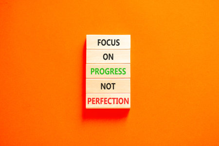 Progress or perfection words symbol. Concept words Focus on progress not perfection on beautiful...
