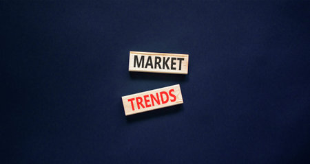 Market trends words symbol. Concept words Market trends on beautiful wooden blocks. Beautiful black...