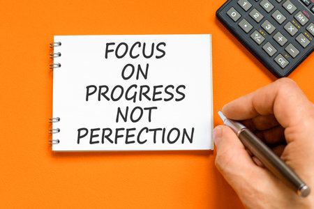 Progress or perfection words symbol. Concept words Focus on progress not perfection on beautiful...