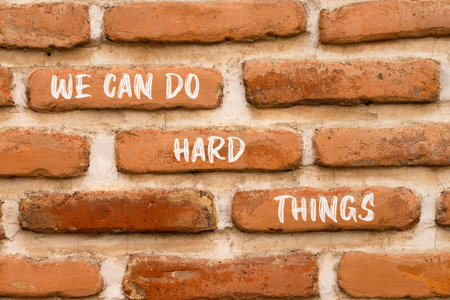 Support, help we can do hard things symbol. Concept words We can do hard things on beautiful brick wall. Beautiful brick wall background. Business we can do hard things concept. Copy space.の写真素材