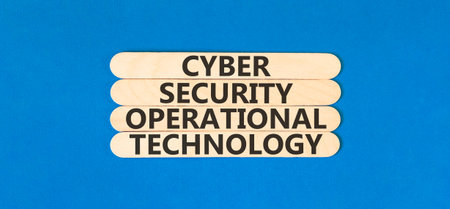 Cyber security symbol. Concept words Cyber security operational technology on beautiful wooden sticks. Beautiful blue background. Business Cyber security operational technology concept. Copy space.