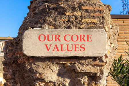 Our core values words symbol. Concept words Our core values on beautiful white sign plate. Beautiful brown brick wall background. Business our core values motivational support concept. Copy space.