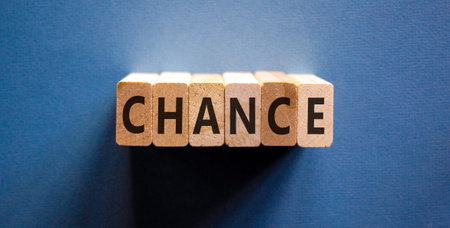 Chance symbol. Concept word Chance on beautiful wooden blocks. Beautiful blue background. Business chance concept. Copy space.