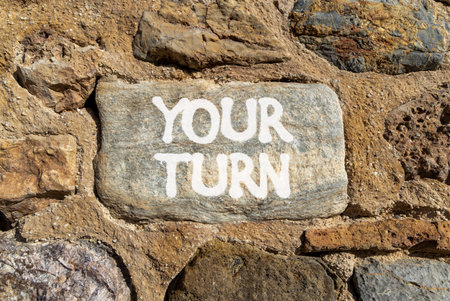 Your turn words symbol. Concept words Your turn on beautiful grey stone. Beautiful stone wall background. Business your turn motivational support concept. Copy space.