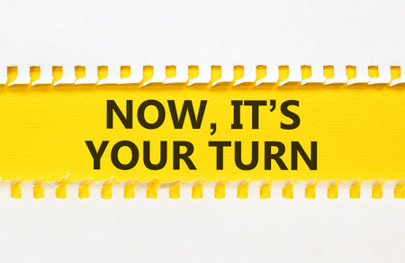 Now it's your turn words symbol. Concept words Now it's your turn on beautiful yellow paper. Beautiful white background. Business Now it's your turn motivational support concept. Copy space.